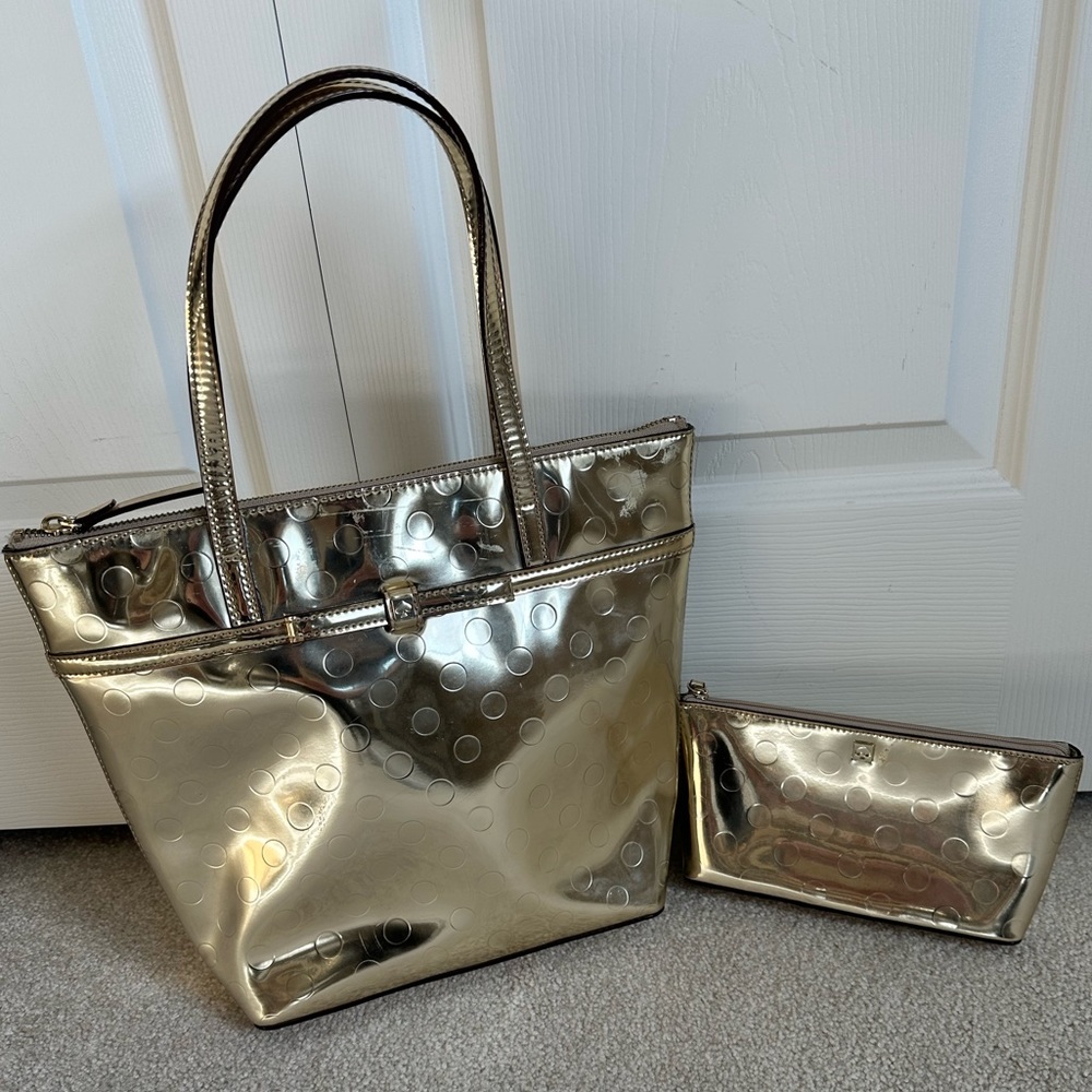 Kate Spade gold tote with additional zippered bag.